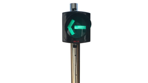 single traffic light with arrow